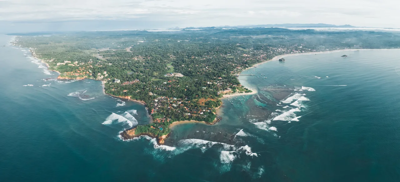 Aerial panorama view of beautiful weligama bay in the morning, sri lanka